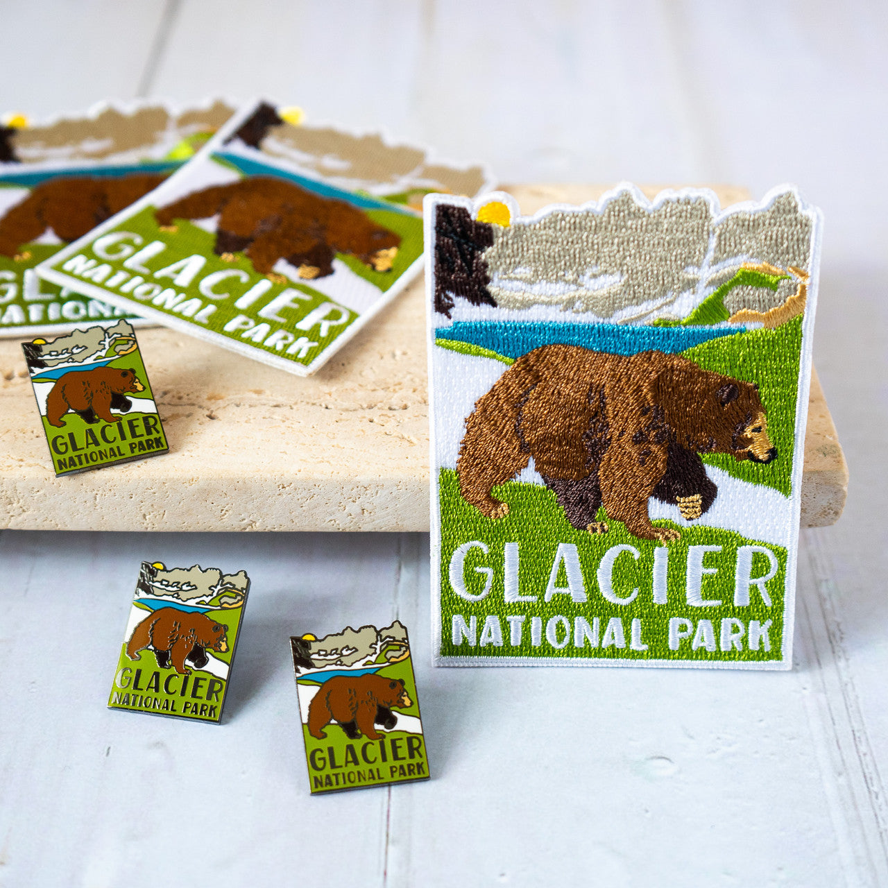 Grizzly Bear with Lake Pin
